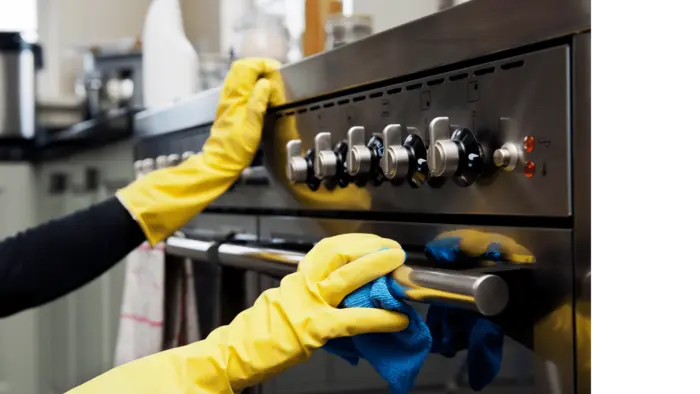 First-Time Cleaning detail work on stovetop and appliance exterior